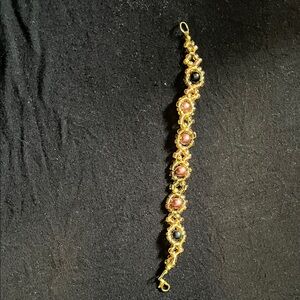 Elegant Gold and Pink Bracelet